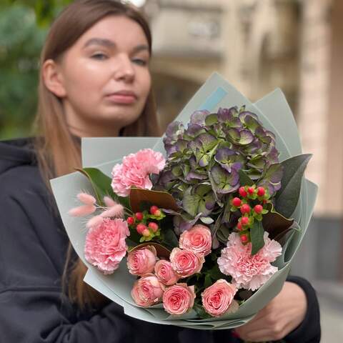 Photo of Interesting bouquet with hydrangea and hypericum «Holiday Compliment»