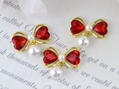 Бантик з камінців з перлинною підвіскою червоний