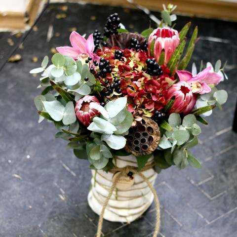Composition of flowers for the congratulation of her husband, Exotic male bouquet with protea