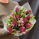 Photo of 25 tulips and skimmia in a bouquet «Katherine's look»