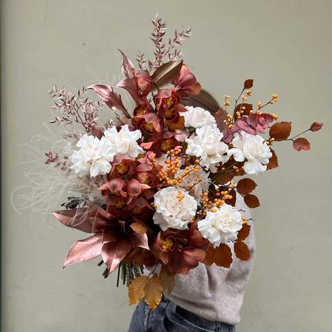 Bouquet «Chocolate Couture», Flowers: Cymbidium, Magnolia, Pion-shaped rose, Stipa, Ilex, Ruscus, Eucalyptus