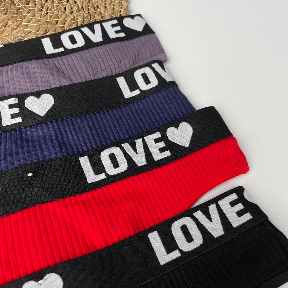 Стрінги з написом на резинці