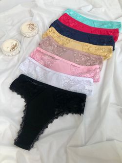 Стрінги з мереживом по боках