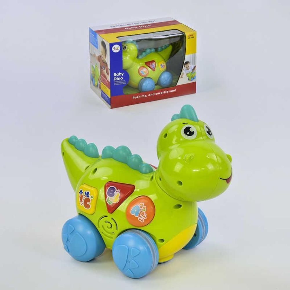 Динозаврик 6105 (18) &quot;Huile Toys&quot;, ездит, говорит на английском языке, проигрывает мелодии и звуки, с подсветкой, в коробке