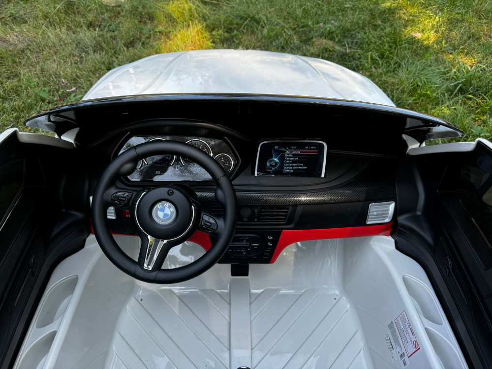 Дитячий двомісний електромобіль джип BMW X6M "WeKids Cars"