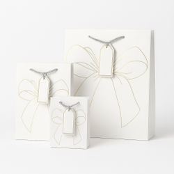 Набор подарочных пакетов с золотым бантом — 3 штуки