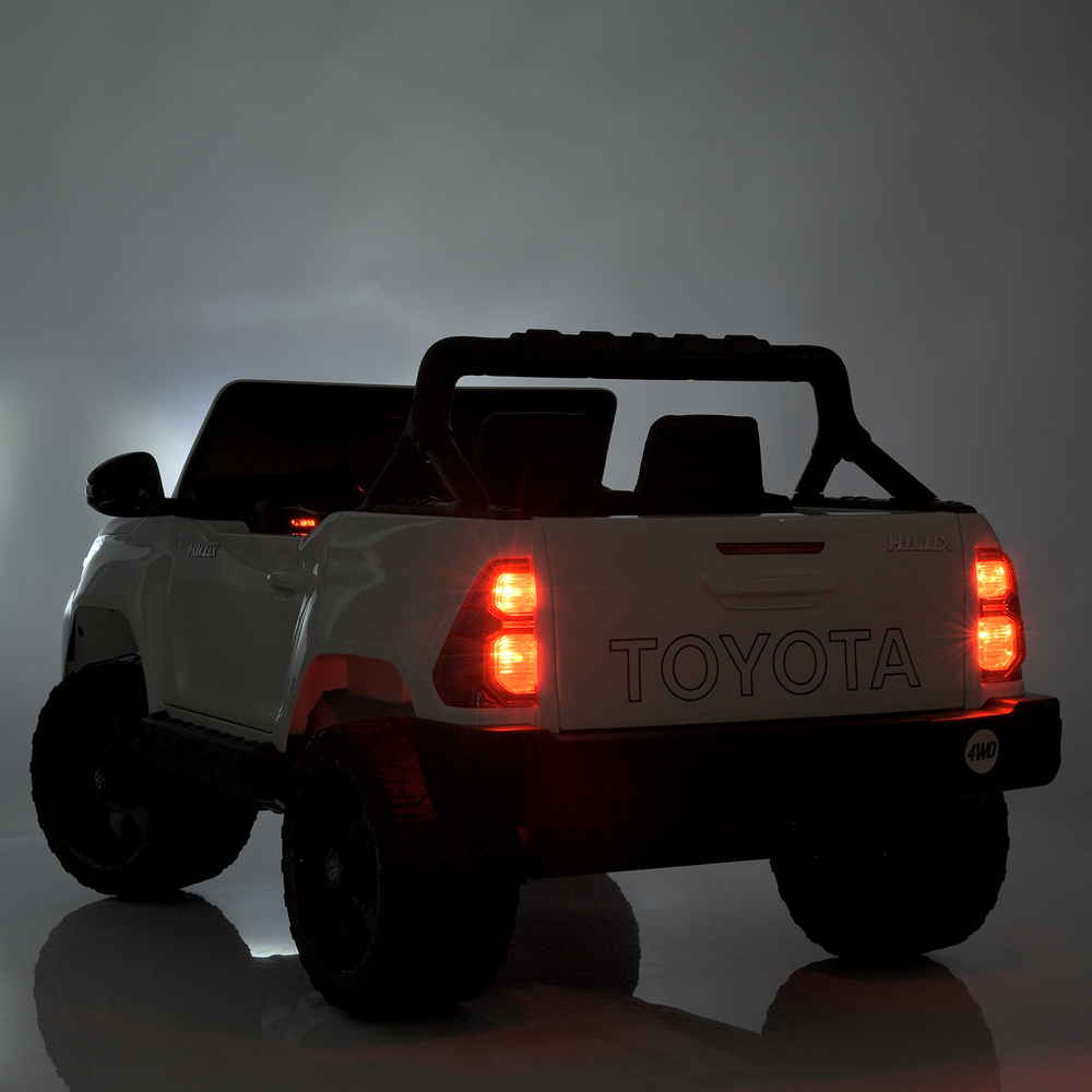 Дитячий електромобіль джип Toyota Hilux 4WD M 4919EBLR