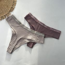 Стрінги з написом на резинці