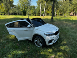 Дитячий двомісний електромобіль джип BMW X6M "WeKids Cars"