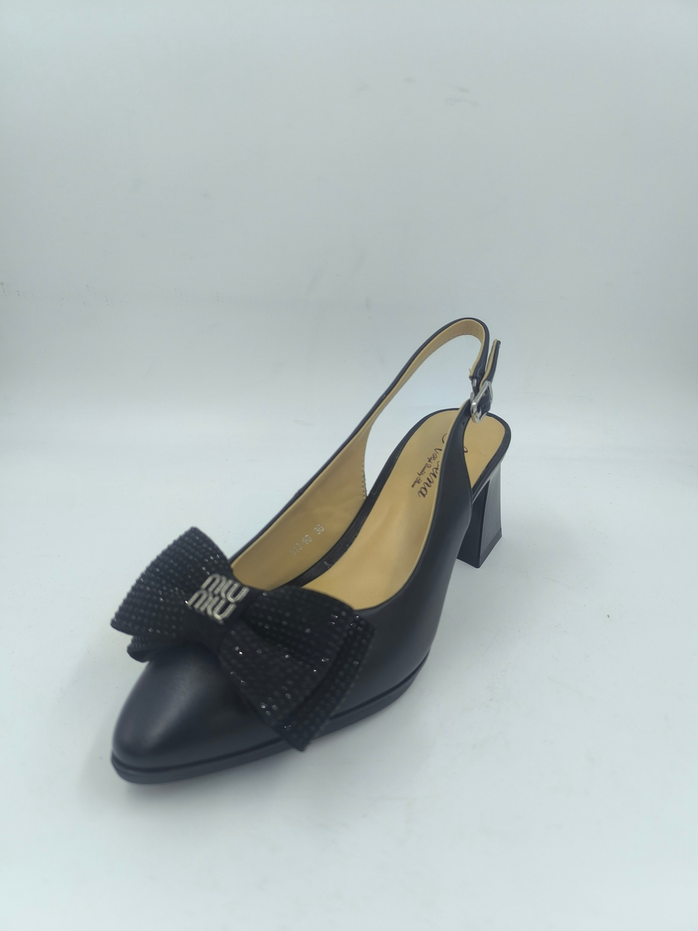 Женские туфли с открытой пяткой и бантом из искусственной кожи